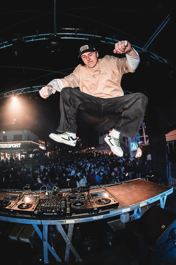 MĀT jumping on stage